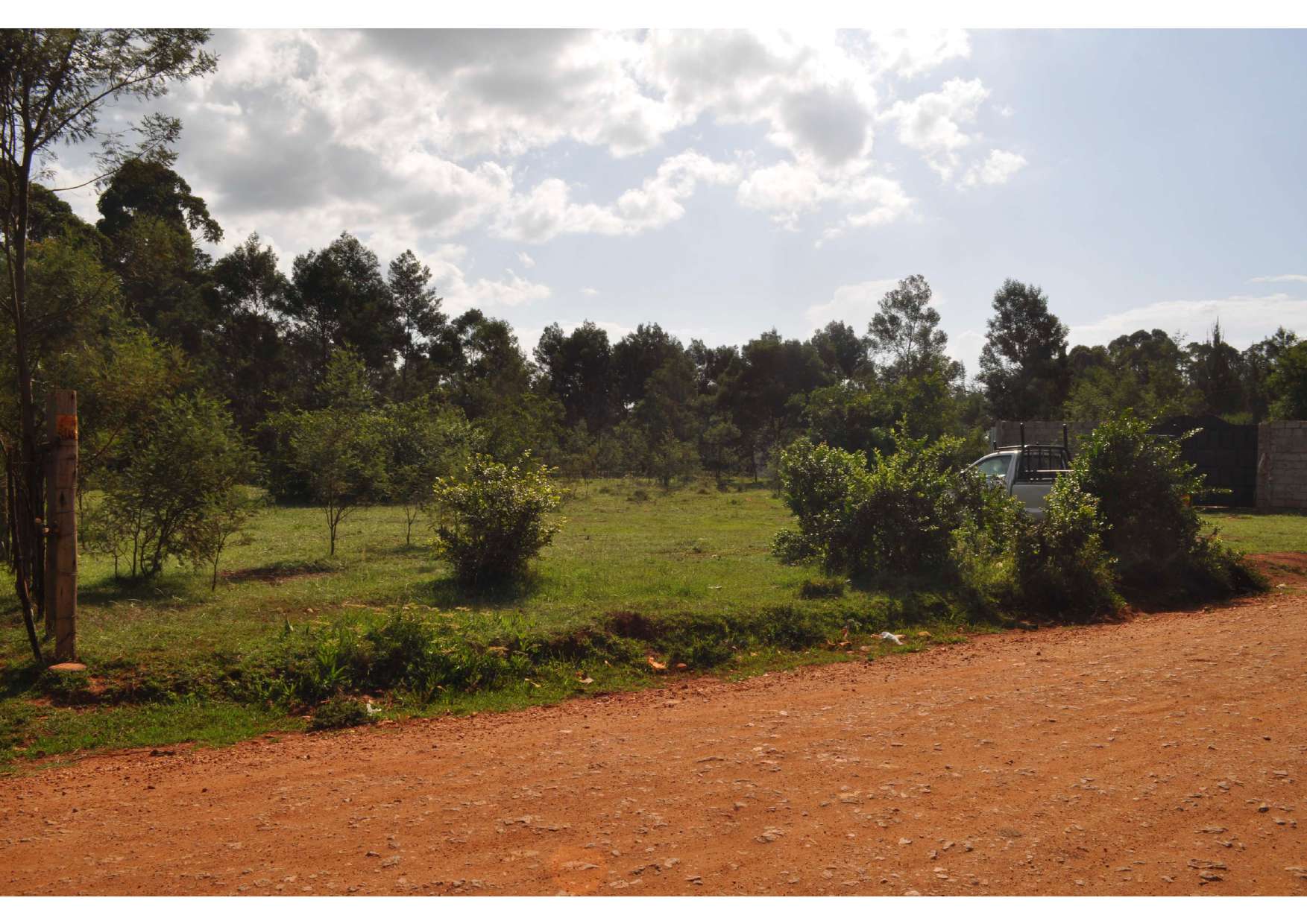 Red murram road alongside the Kipkenyo plots, Eldoret